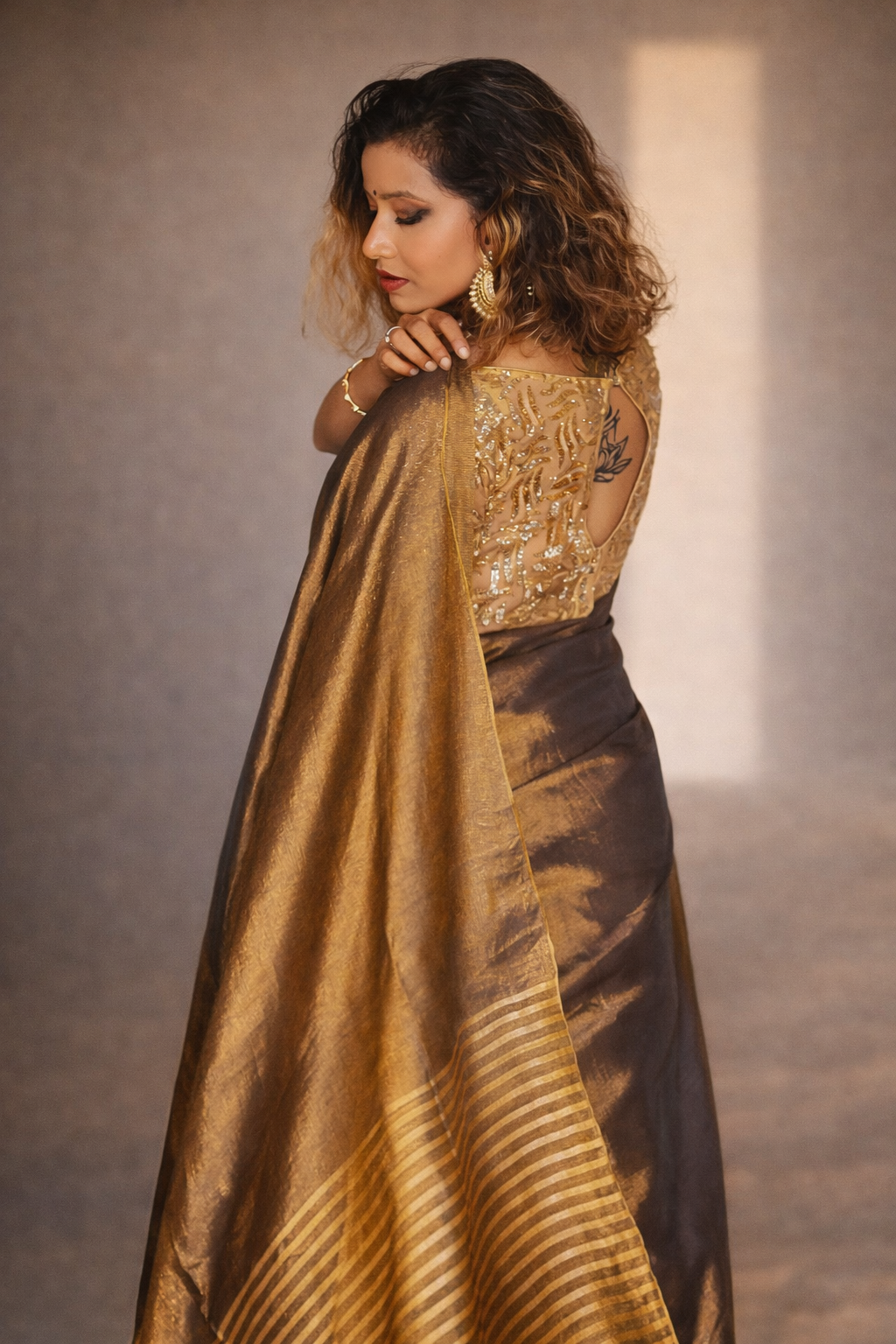 Copper Crush – Copper Handloom Tissue Silk Saree draped elegantly by RongSuta