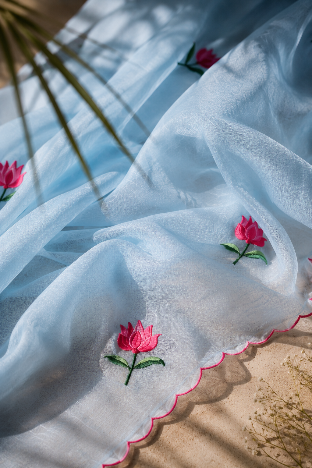 Cloud Kiss — Sky Blue Lotus Embroidery Mul Mul Saree